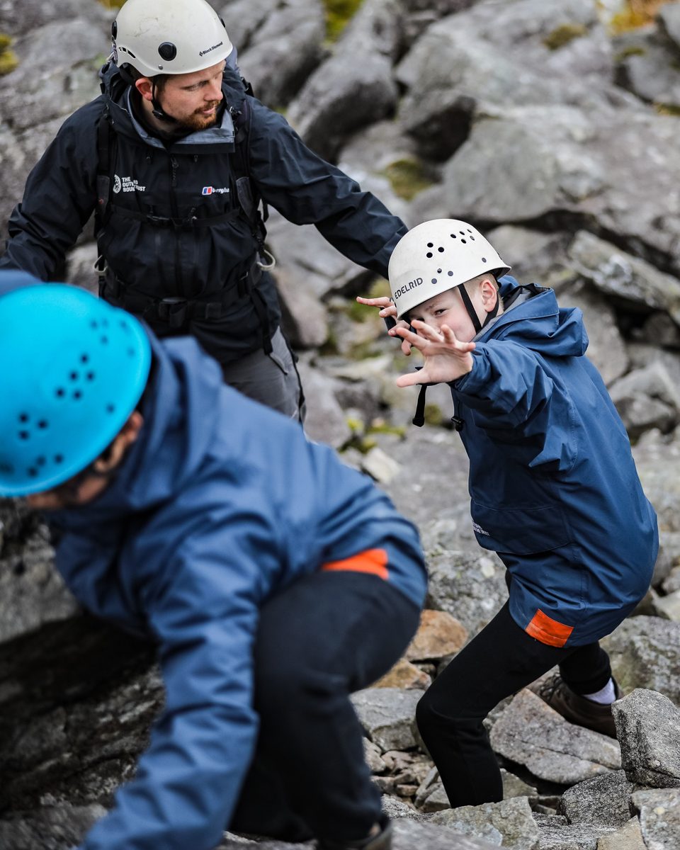 Boy-instructor-climbing-young-tall-aberdovey-960x1200